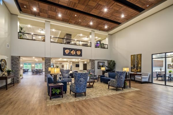 Interior view of a spacious common area with seating