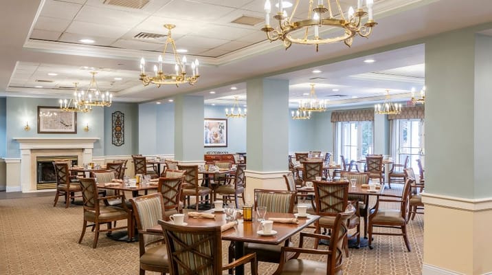Bright and welcoming dining room with tables and chairs