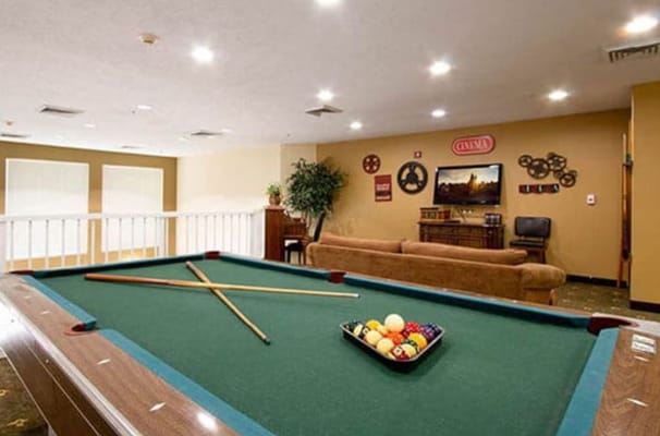 Interior view of a game room with a pool table