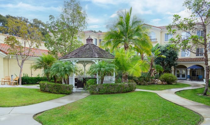Beautiful outdoor garden with gazebo and manicured paths