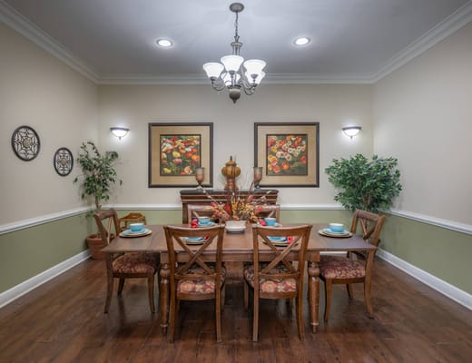Dining area with a wooden table and chairs