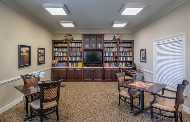 Interior of a cozy library or common area with bookshelves