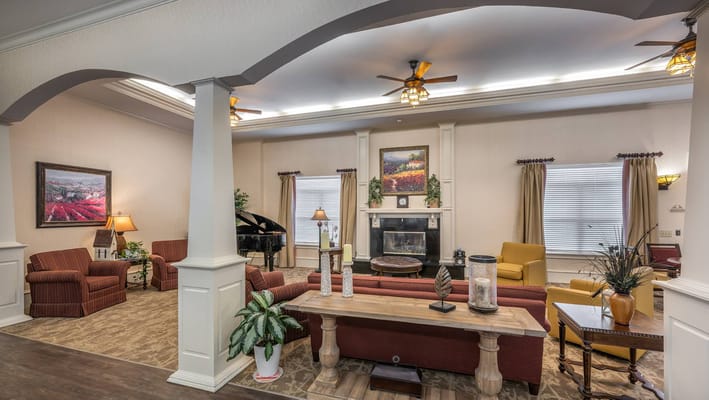 Interior common area with seating and piano