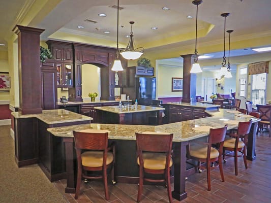 Interior view of a dining area with a kitchen