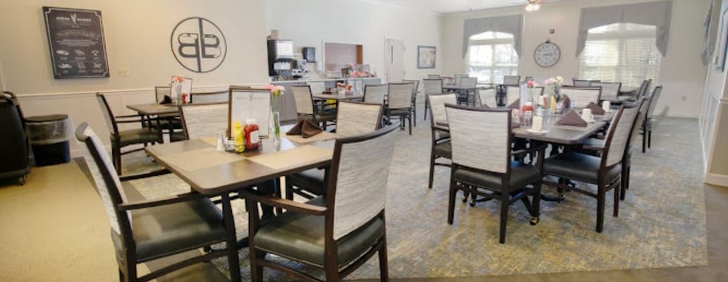 Dining area with tables set for service