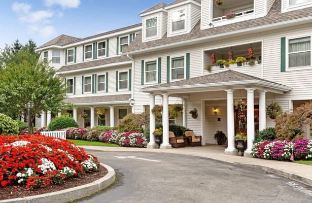 Exterior view of Brighton Gardens with vibrant flowers