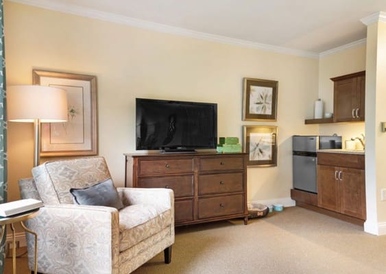 Cozy interior view of a resident room with furniture