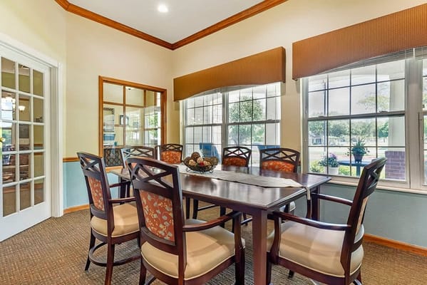 Dining room with a large table and chairs