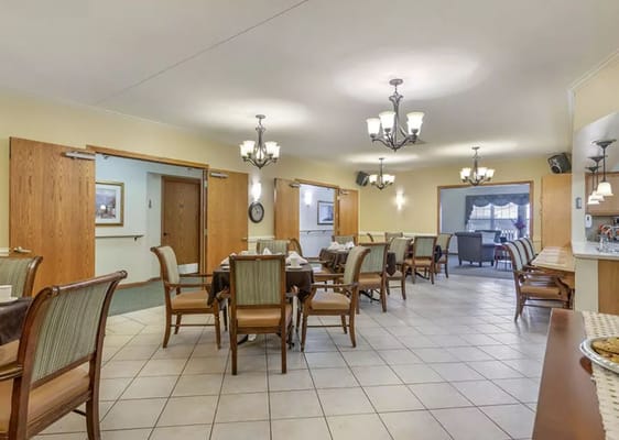 Interior view of the dining room with tables and chairs