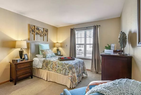 Cozy private room with bed and decor