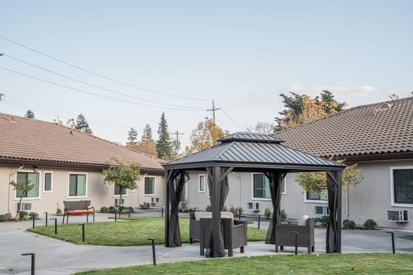 Outdoor gazebo area in a memory care facility