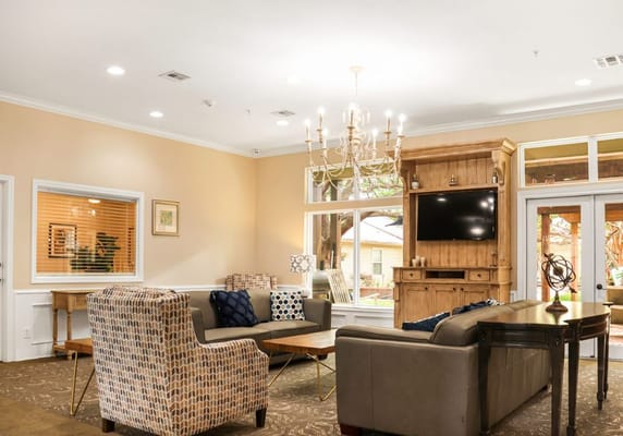 Cozy common area with seating in a senior living facility