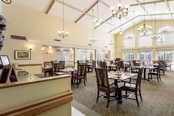 Spacious dining area with tables and chairs at Cascades of Chesterley