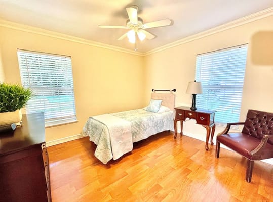 A spacious private resident room with natural light