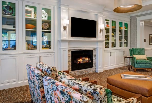 Cozy common area with fireplace and comfortable seating