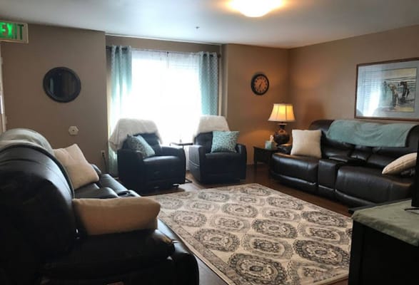 Cozy common area with seating and natural light