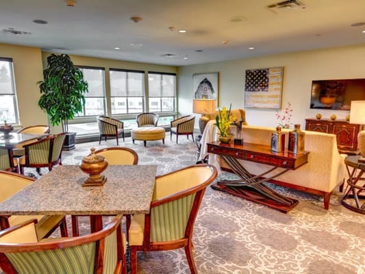 Interior common area with seating and dining table