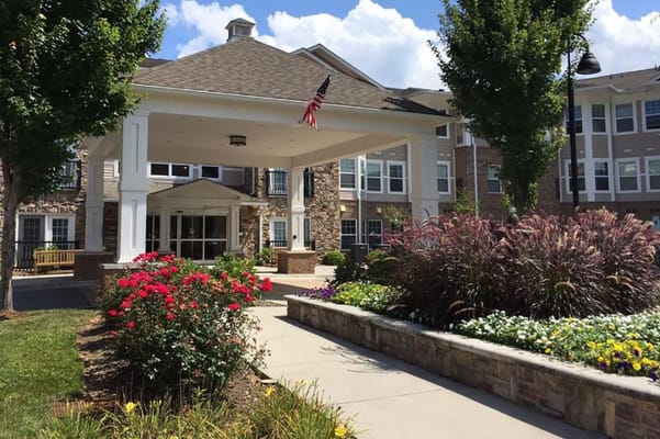 Entrance of Givens Great Laurels with landscaped garden