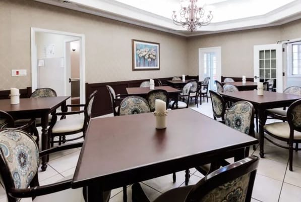 Bright dining area with tables and chairs
