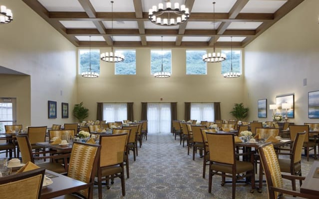 Bright dining room with tables and chairs