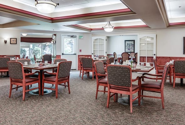 Interior of the dining room with tables and chairs