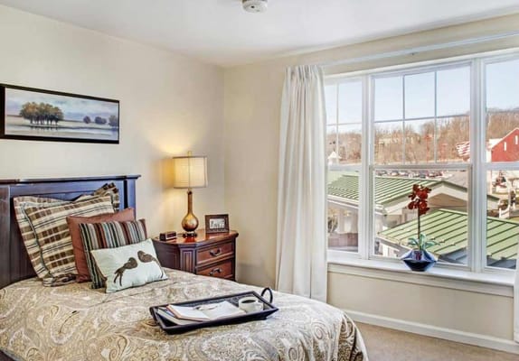 Cozy resident room with a view and tasteful decor