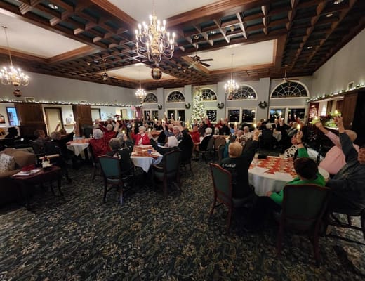 Residents enjoying a holiday celebration in the dining area