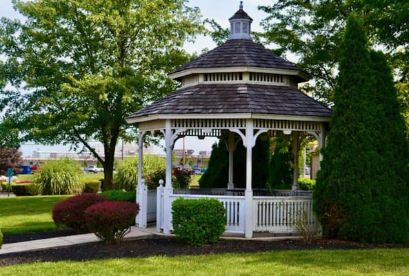 Charming gazebo in a landscaped garden area