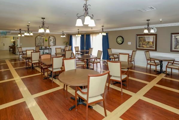 Spacious dining area with tables and chairs