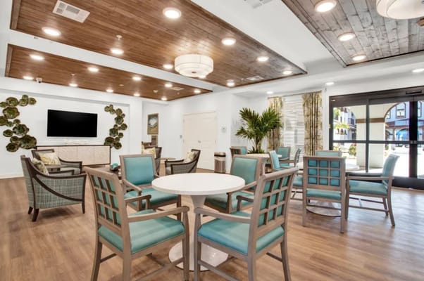 Bright lounge area with comfortable seating and modern decor.