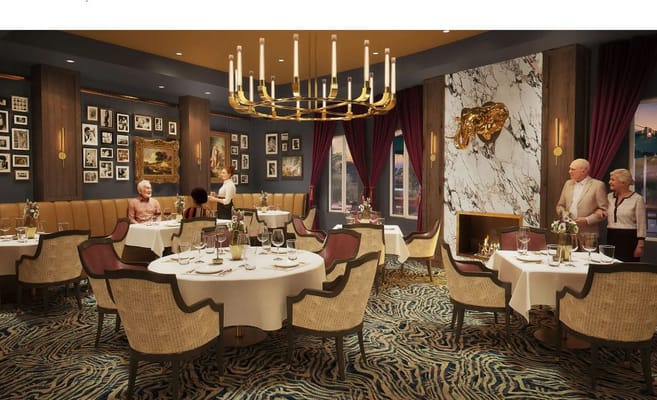 Interior of a dining room with elegantly set tables and art on the walls.