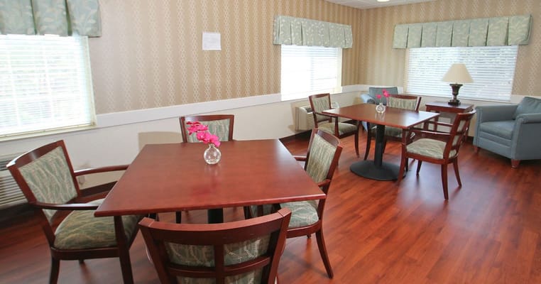 Interior common area with tables and chairs