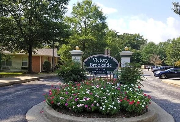 Exterior sign at Victory Brookside Senior Apartments