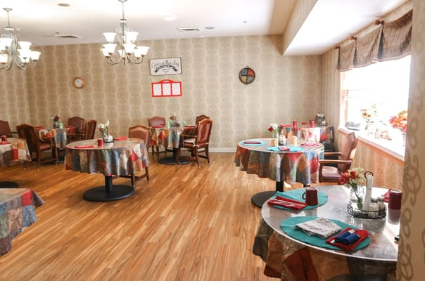 Dining area with tables set for meals