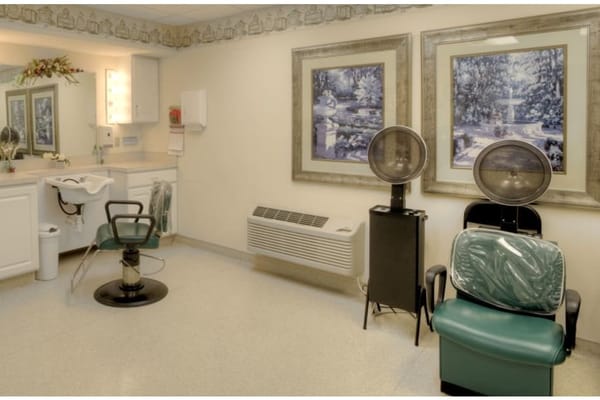 Interior of a beauty salon with salon chairs and mirrors