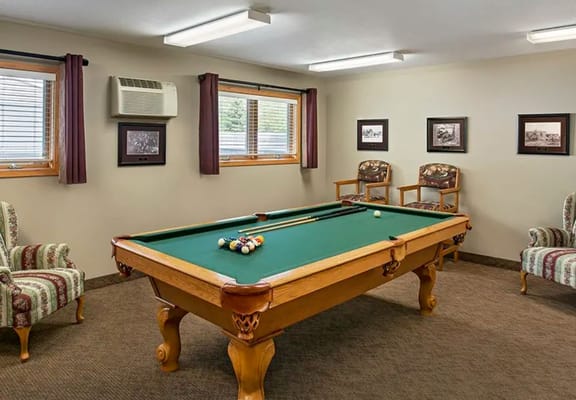 Billiard table in a common area activity room