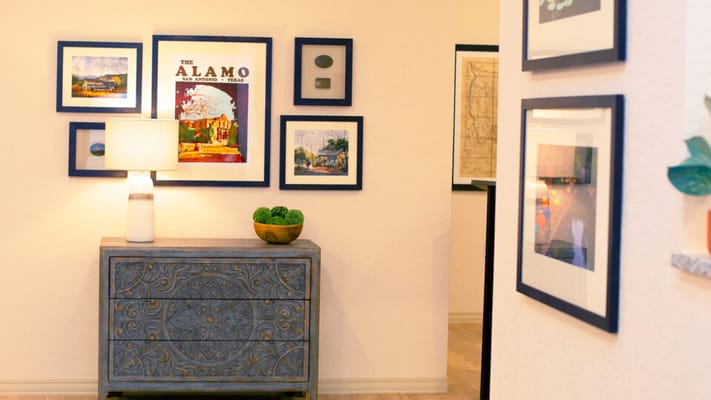 Bright interior hallway with art and decor