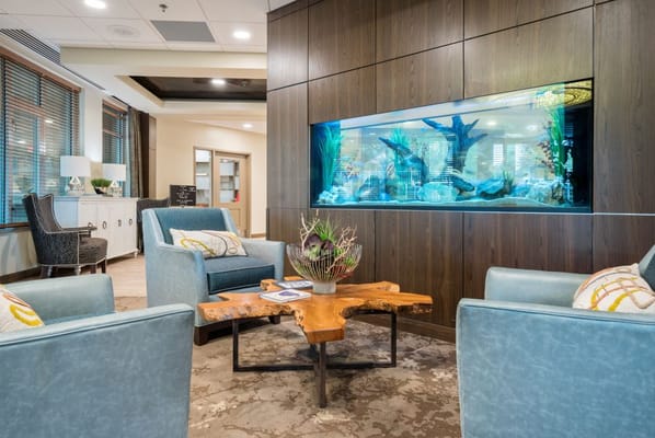 Interior common area with seating and an aquarium