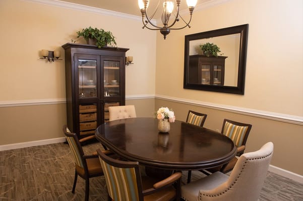 Elegant dining room with round table and chairs