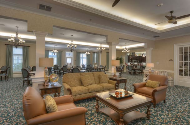 Interior common area with seating and dining layout