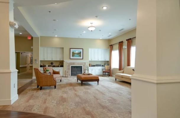 Cozy lounge area with comfortable seating and fireplace