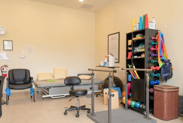 Interior view of a therapy room with equipment