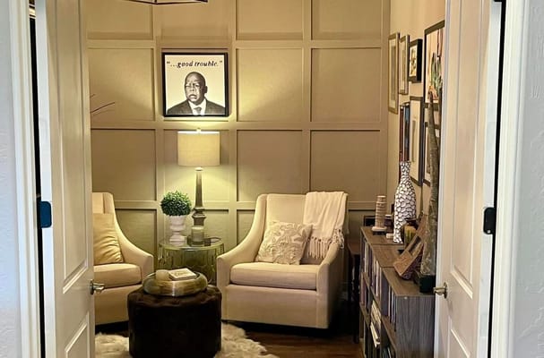 Cozy interior space with armchairs and artwork