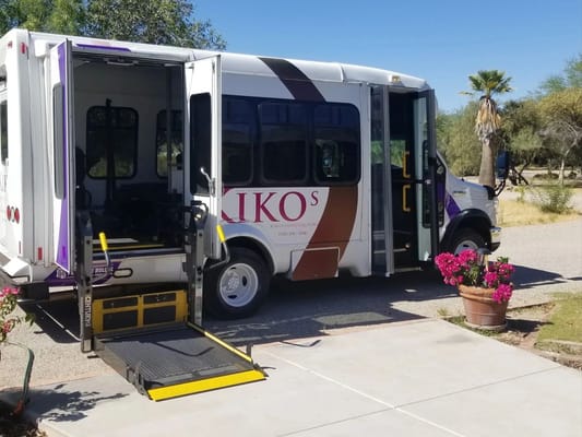 Facility shuttle bus with accessible ramp