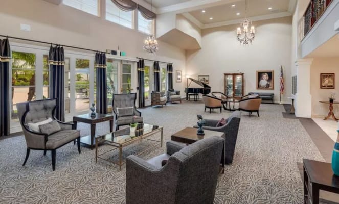 Interior lounge area with seating and piano