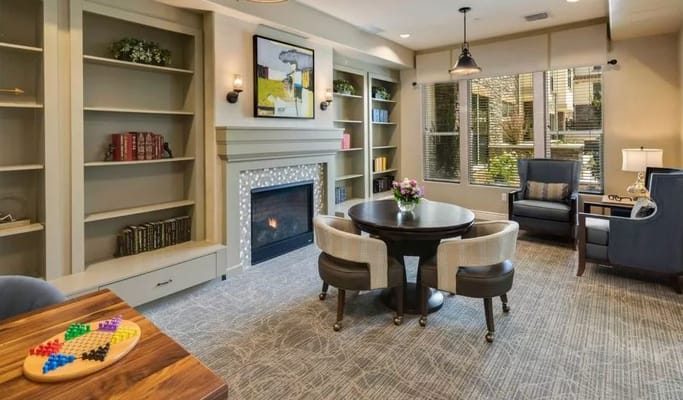 Cozy common area with a fireplace and seating