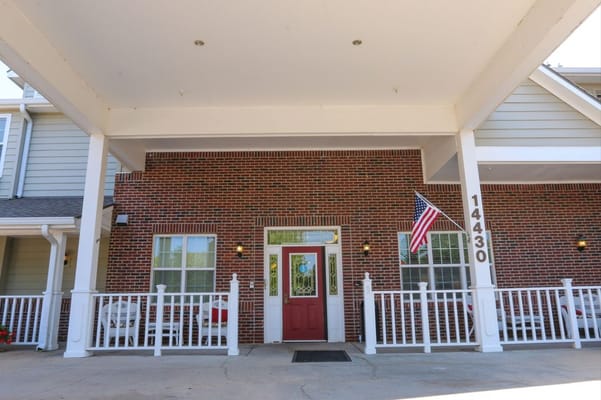 Front entrance of Vintage Park at Stanley with American flag
