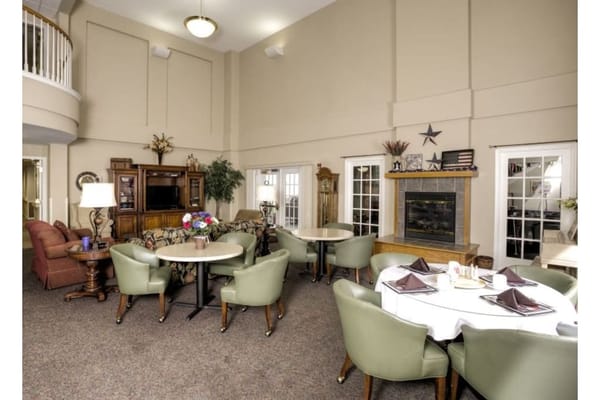 Common area with seating and fireplace at Vintage Park at Stanley