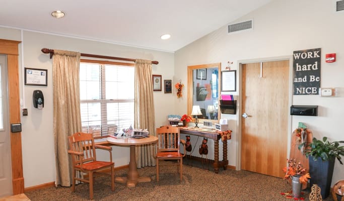 A cozy common area with seating and decor