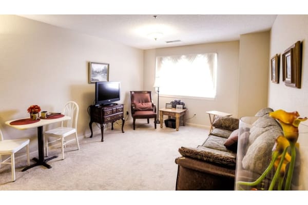 Spacious living room with furniture and TV.